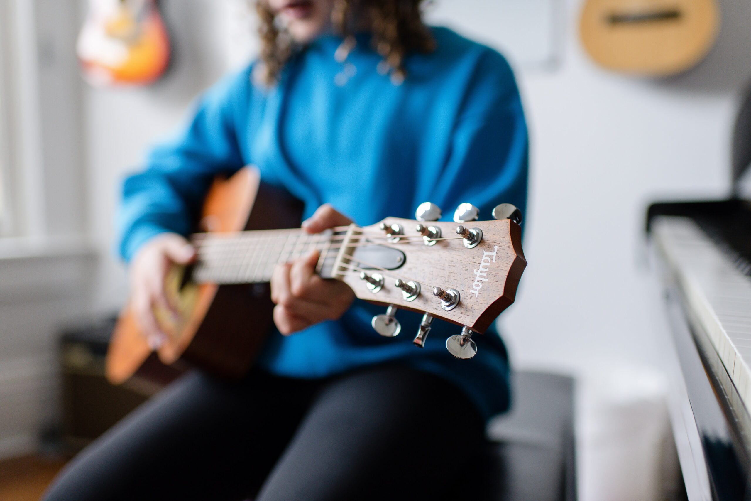 student playing guitar