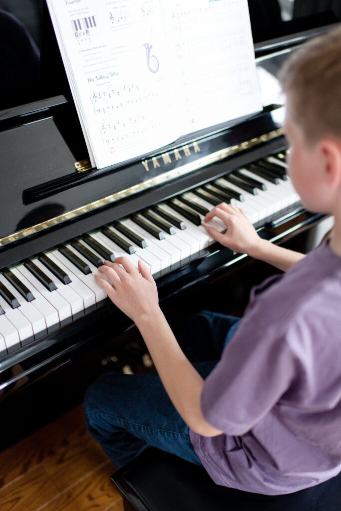 student playing piano